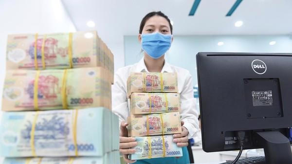 Triển khai cơ cấu lại hệ thống các tổ chức tín dụng gắn với xử lý nợ xấu