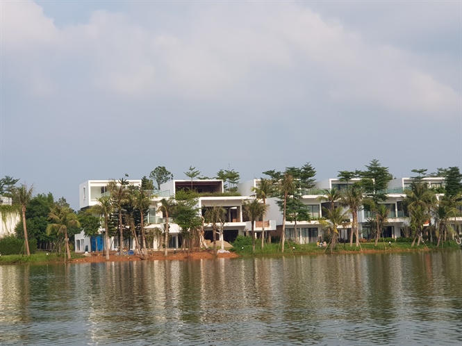 Flamingo Đại Lải Resort lấp hồ, phá đảo, chính quyền bất lực?