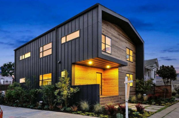 Ngôi nhà gỗ đơn giản bên ngoài, hiện đại bên trong