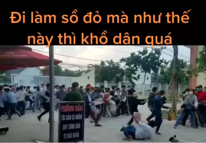Hình ảnh cắt từ clip hàng trăm người xô đẩy làm hồ sơ đất đai ở Bình Phước. &nbsp;