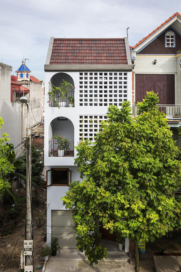 Nhà cho mưa đưa cả lối sống xưa vào kiến trúc hiện đại - Ảnh 1.