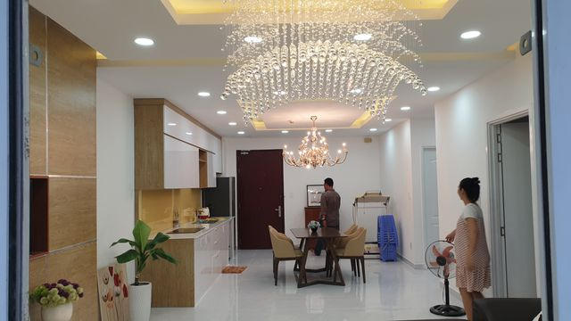 Sau vụ cháy, gia đình chị Ái Thi đã mua lại căn hộ A106 chung cư Carina và dọn về ở sau Tết