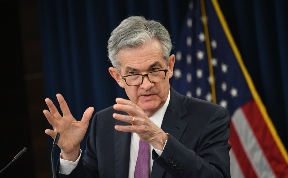 Fed hạ lãi suất giữa lúc thiếu dữ liệu kinh tế, tuyên bố thời điểm kết thúc chương trình thắt chặt định lượng