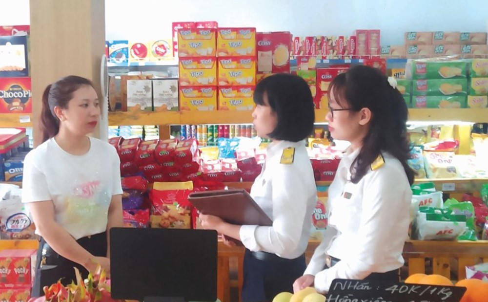 Bộ Tài chính đề xuất nâng ngưỡng doanh thu miễn thuế hộ kinh doanh lên 500 triệu đồng/năm - ảnh 1