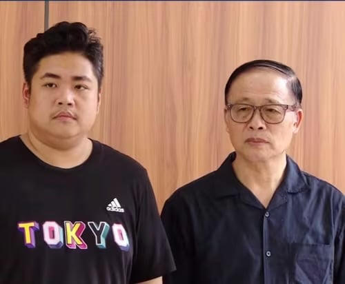 Ông Vũ Minh Châu và con trai Vũ Minh Tú tại cơ quan điều tra.