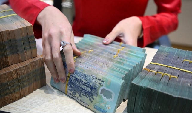 Ngân hàng đua trả cổ tức tiền mặt, nhiều nhà băng chi hàng tỷ USD cho cổ đông (Ảnh minh họa).