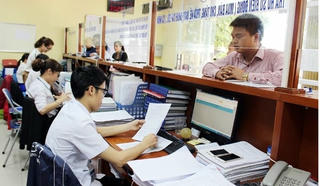 Người dân thực hiện thủ tục đất đai sau khi bỏ cấp huyện ở đâu?
