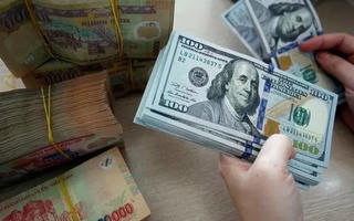 Tỷ giá hạ nhiệt nhưng còn nhiều biến số đầy thách thức