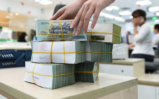 Điều chỉnh tăng tỷ lệ an toàn vốn các ngân hàng thương mại