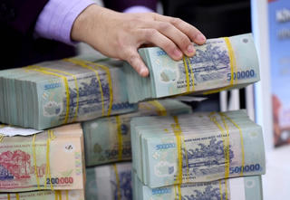 Tổng tài sản ngành ngân hàng bất ngờ giảm mạnh