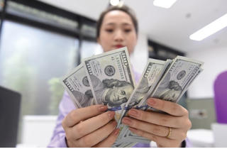 Khi USD tạm yên, nhìn lại quyết định tăng lãi suất để ghìm tỷ giá