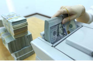 Ngân hàng Nhà nước giảm giá bán, tỷ giá USD/VND giảm mạnh