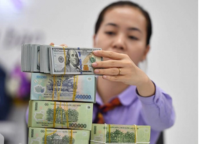 Giá USD ngân hàng vượt mốc 25.000 đồng