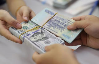 Động thái mới trên thị trường ngoại tệ: Kho bạc Nhà nước bơm lượng lớn VND