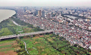 Đề xuất sử dụng đất ngoài đê sông Hồng làm bãi đỗ xe