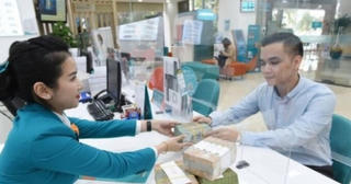Nhiều ngân hàng bắt đầu giảm lãi suất tiền gửi