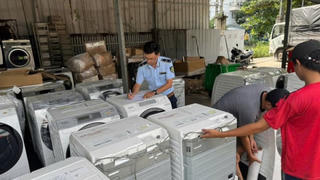 Phát hiện kho máy giặt, điều hòa không khí thuộc diện cấm nhập khẩu