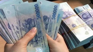 Tiền lương tháng 12/2025 được chi trả vào đầu năm 2026 thì tính Thuế TNCN như thế nào?