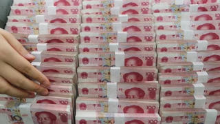 Đồng nhân dân tệ của Trung Quốc tăng giá mạnh nhất trong 10 tháng